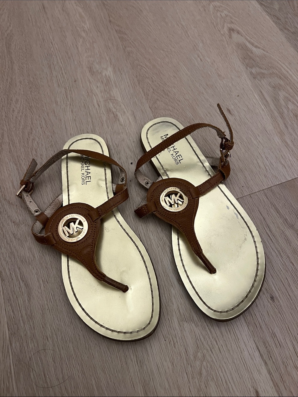 Michael Kors Brown and Gold Leather Logo Thong Sandals - Picture 1 of 2